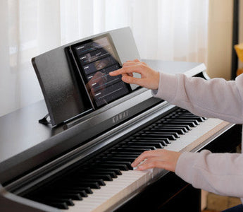 Learning to Play Piano in Different Styles